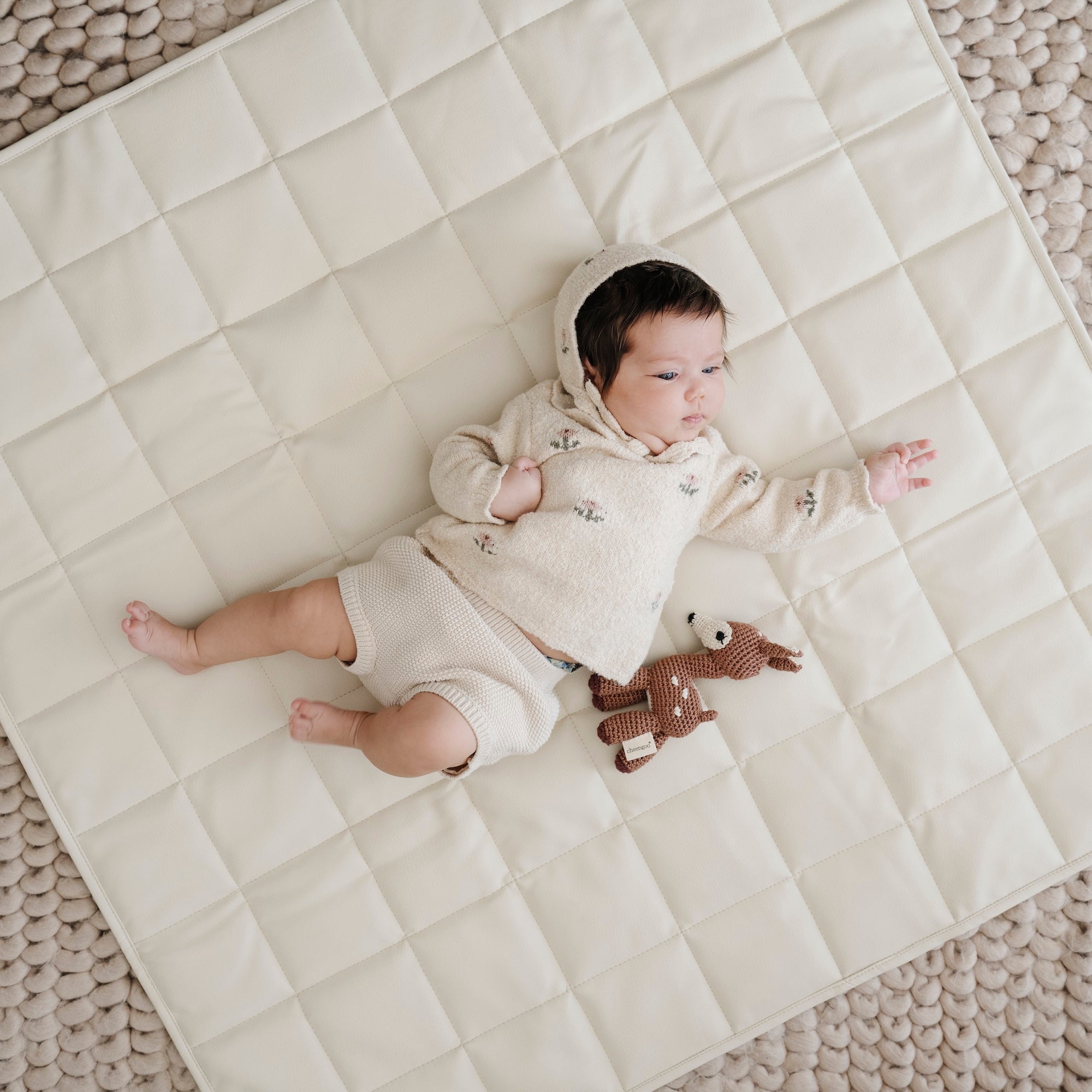 Ivory / Square@lifestyle image of baby on mat