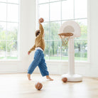 Ivory@Modern basketball hoop for toddlers styled in a home play space