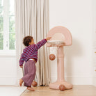 Tulle@Toddler playing with Toddler basketball hoop designed for indoor and outdoor play