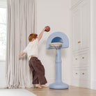 Quarry@Toddler basketball hoop designed for indoor and outdoor play being played with in a home