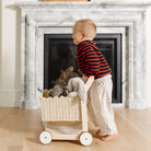Ivory@lifestyle image of girl playing with a shopping trolley