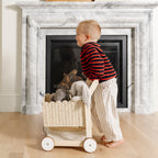 Ivory@lifestyle image of girl playing with a shopping trolley