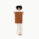 Ginger (on sale)@Woman holding the Ginger Micro Mat