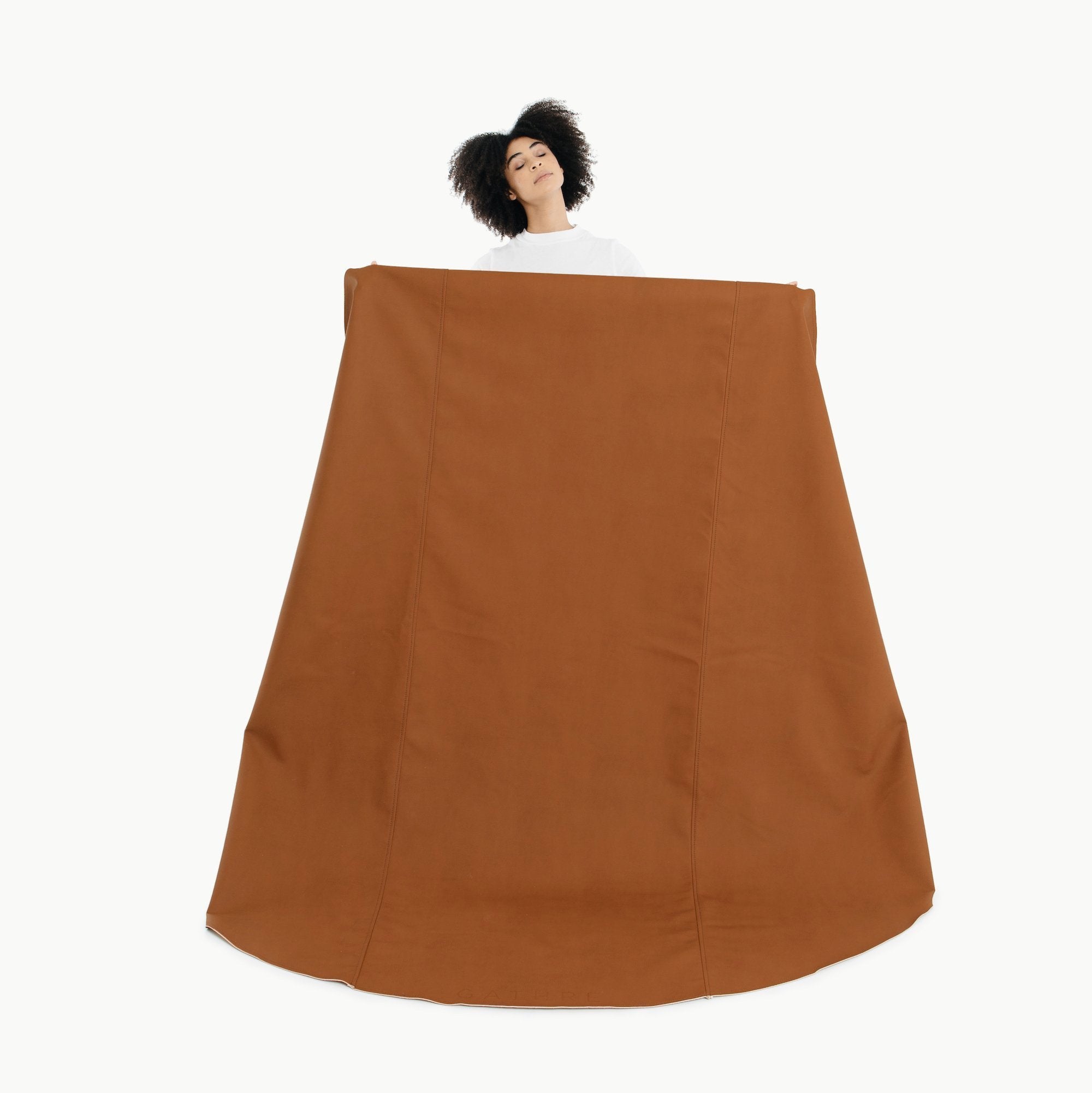 Ginger (on sale) / Circle@woman holding the ginger maxi circle mat 