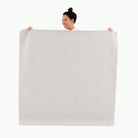Gull (on sale) / Square@Woman holding the Gull Square Midi Mat