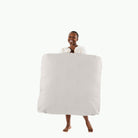 Gull (on sale) / Square@Woman holding the Gull Square Floor Cushion