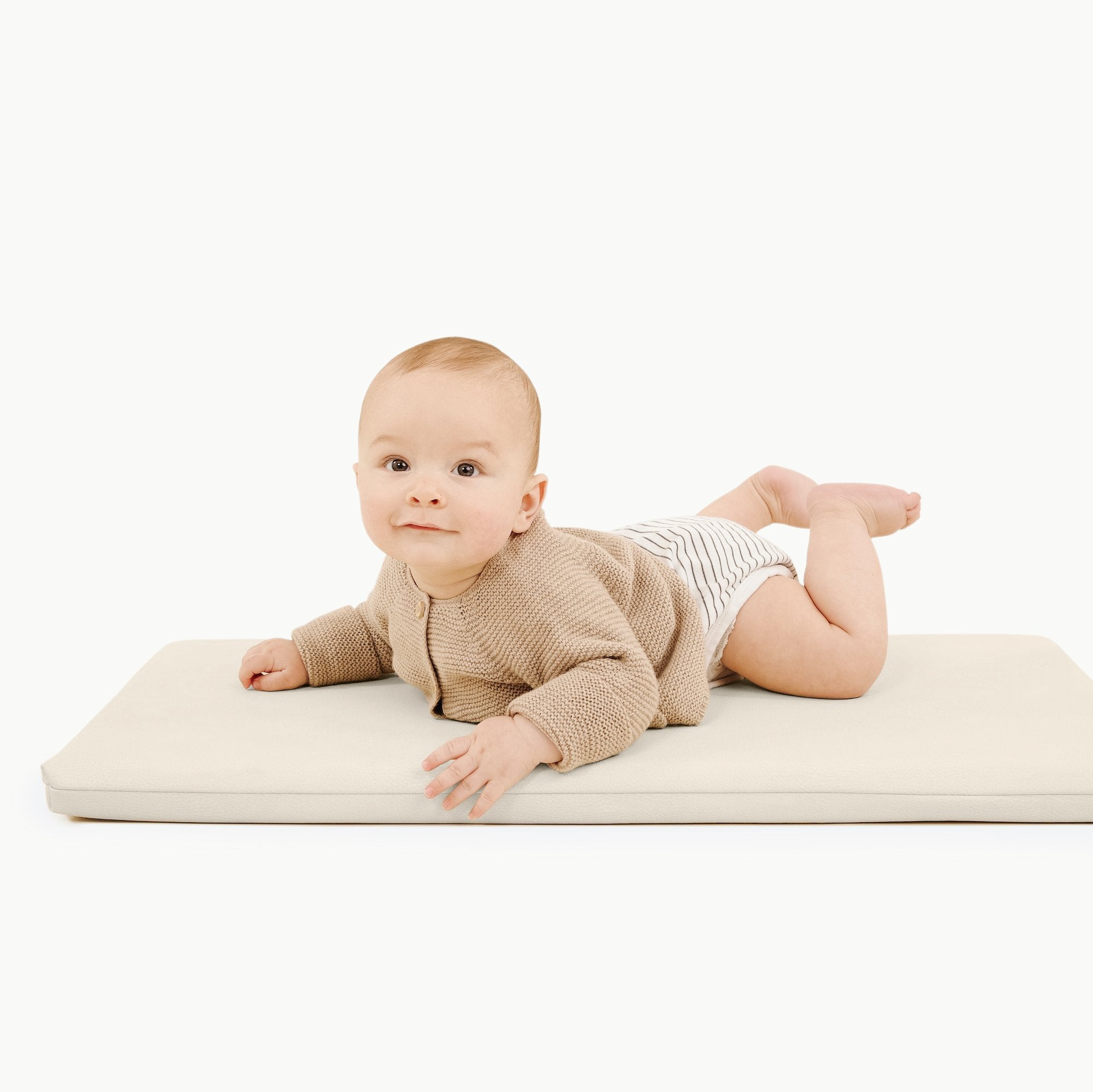 Ivory@Baby laying on Ivory padded micro+