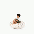 Menagerie / Circle@Kid sitting on the Menagerie Circle Floor Cushion