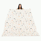 Menagerie / Square@Woman holding the Menagerie Maxi Square Mat