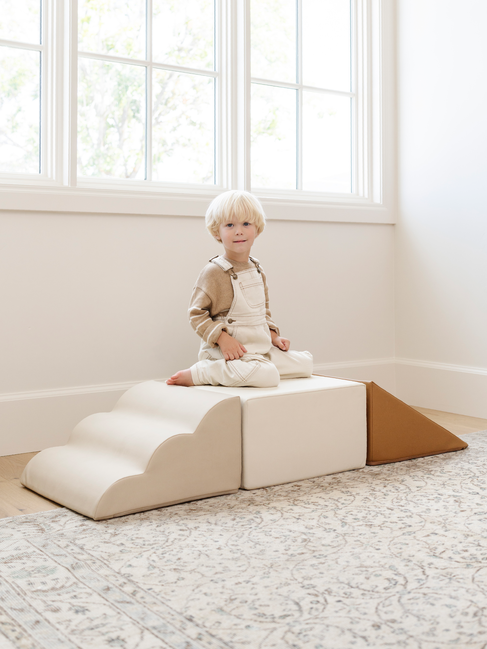 Kid playing on the Gathre Mini Climber Playset