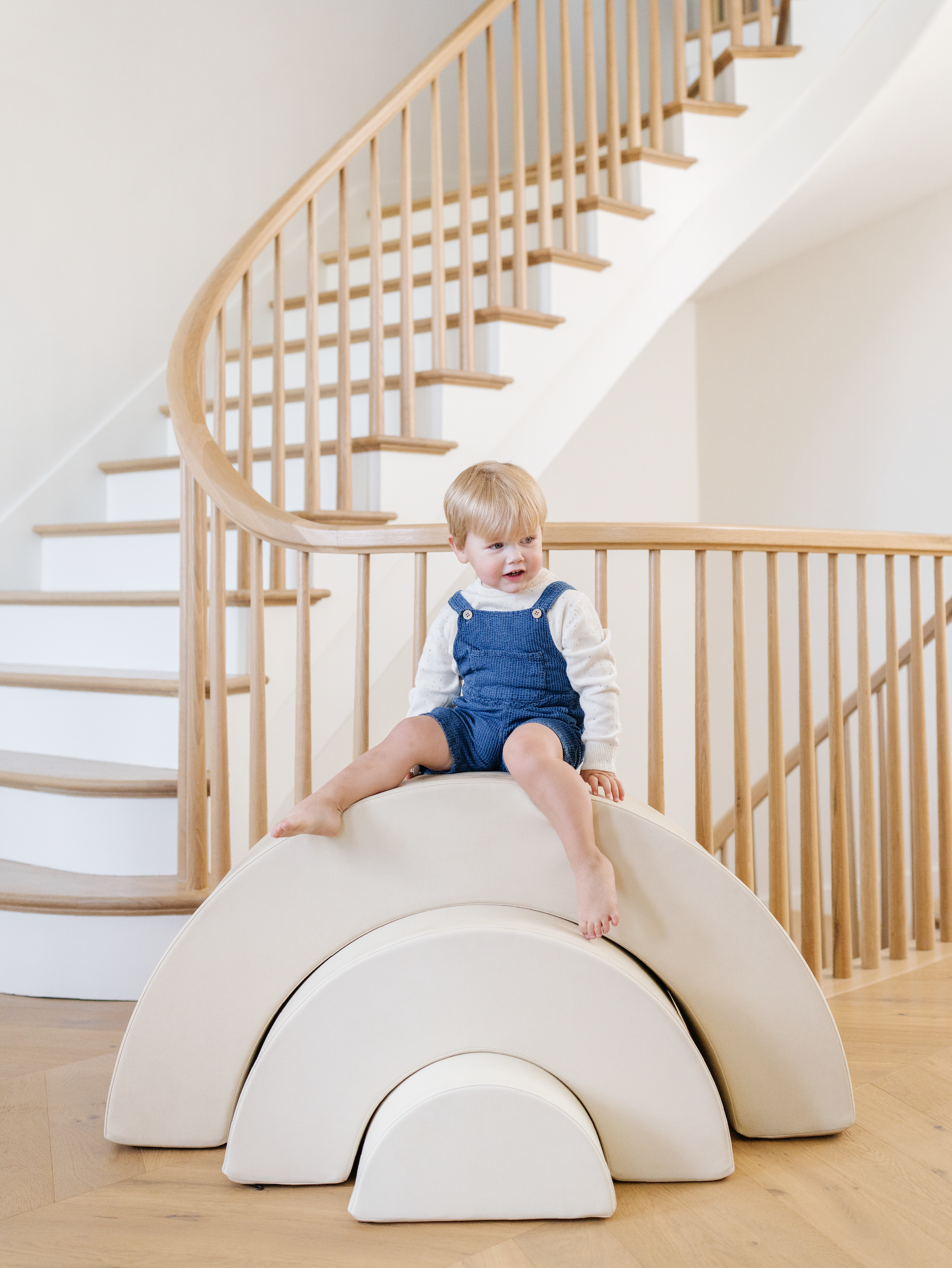 Kid playing on the Gathre Arc Playset.