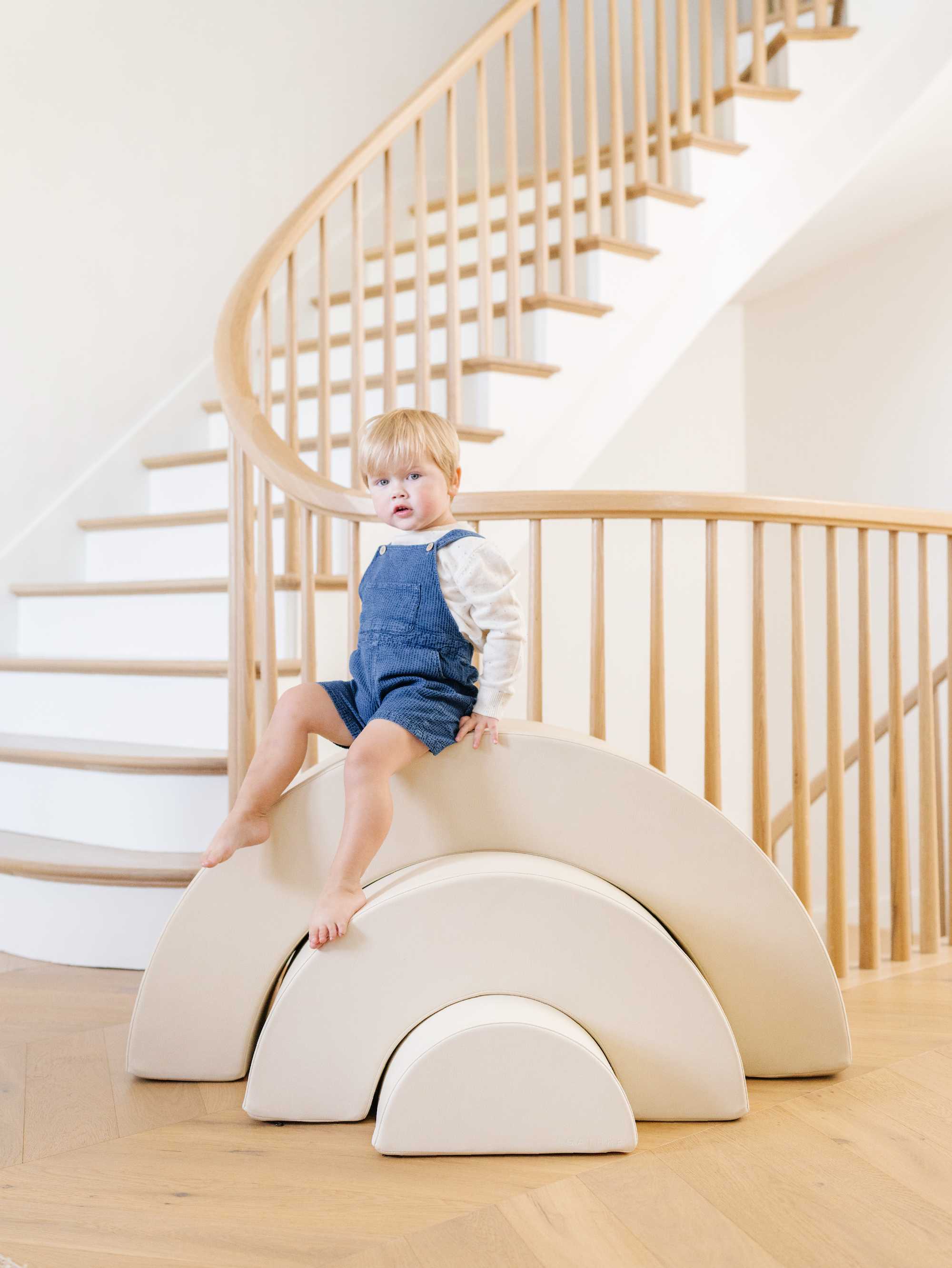 Kid playing on the Gathre Arc Playset.