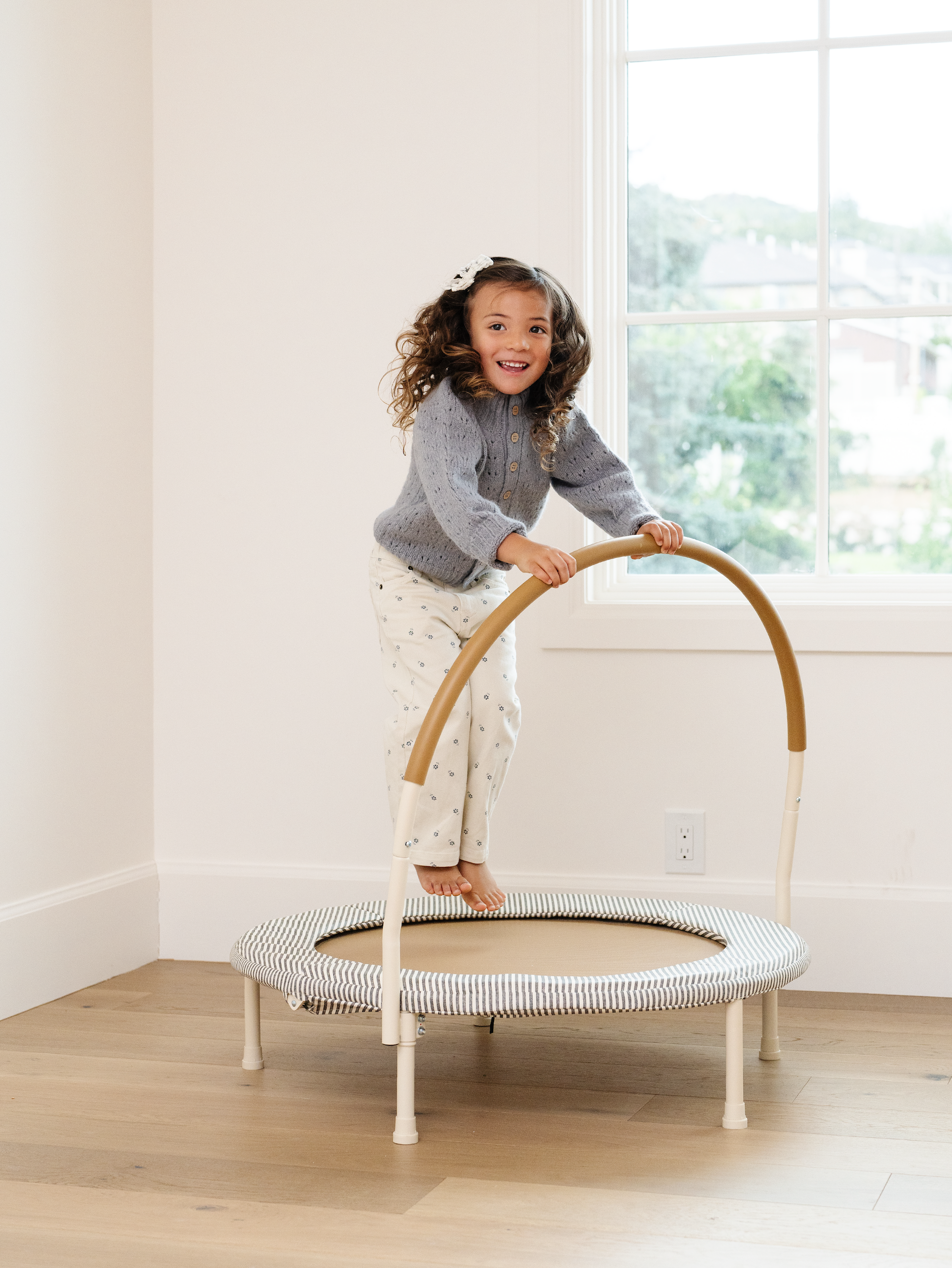 Kid playing on the Gathre Trampoline.