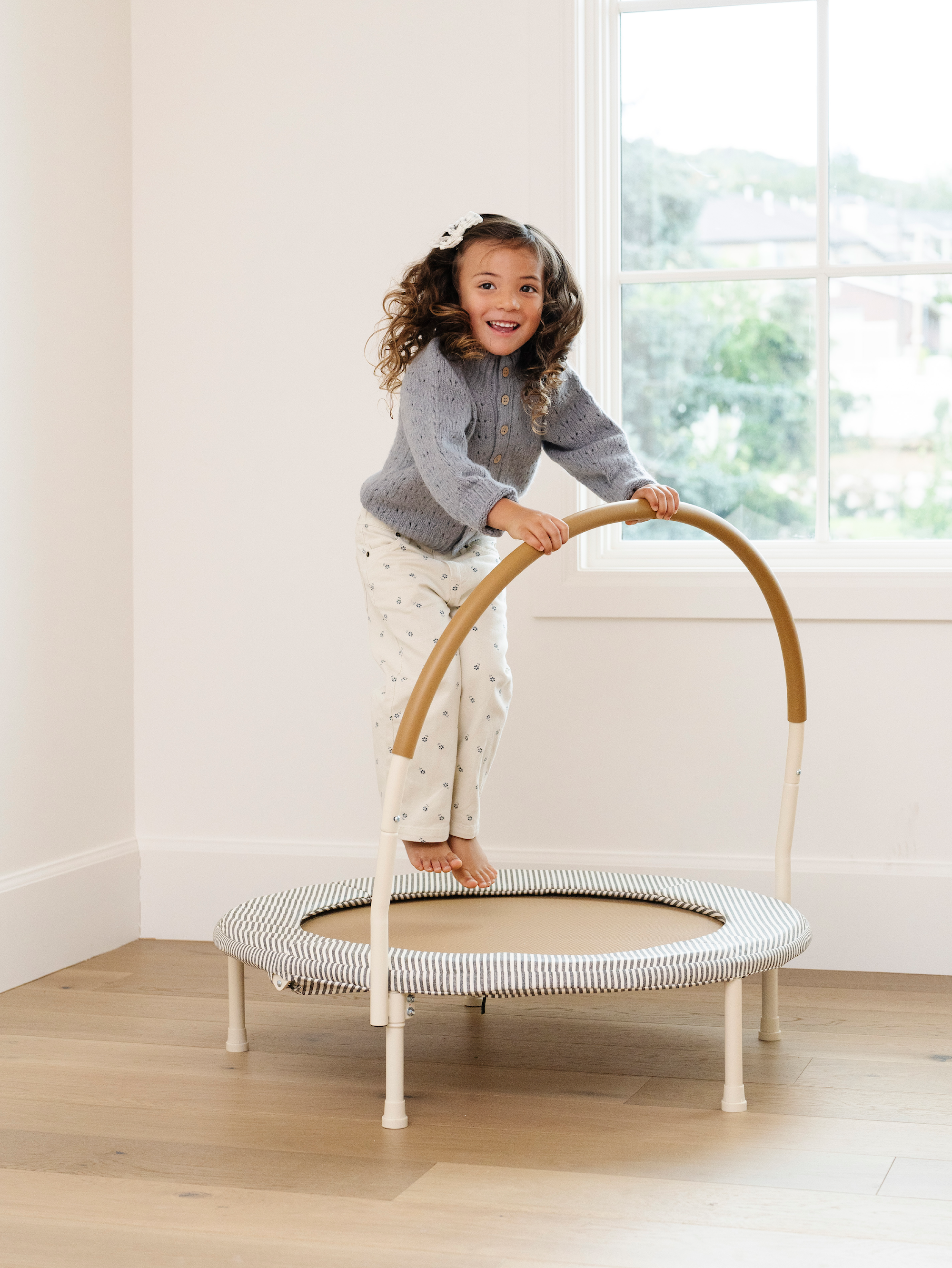 Kid playing on the Gathre Trampoline.