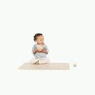 Mickey Mouse (on sale)@Baby sitting on the Mickey Mouse Micro+ Mat