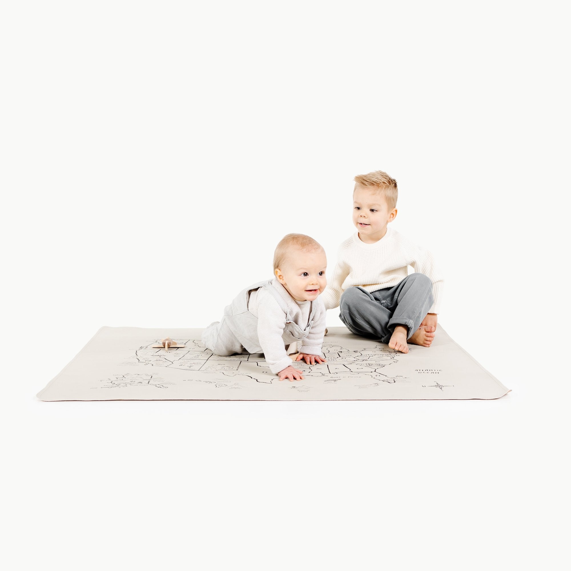 National Parks Map@Baby sitting on the National Parks Map Mini+ Mat