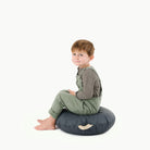 Nightfall (on sale) / Circle@kid sitting on the nightfall mini circle floor cushion