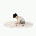 Commons@Little boy playing on Midi Circle mat