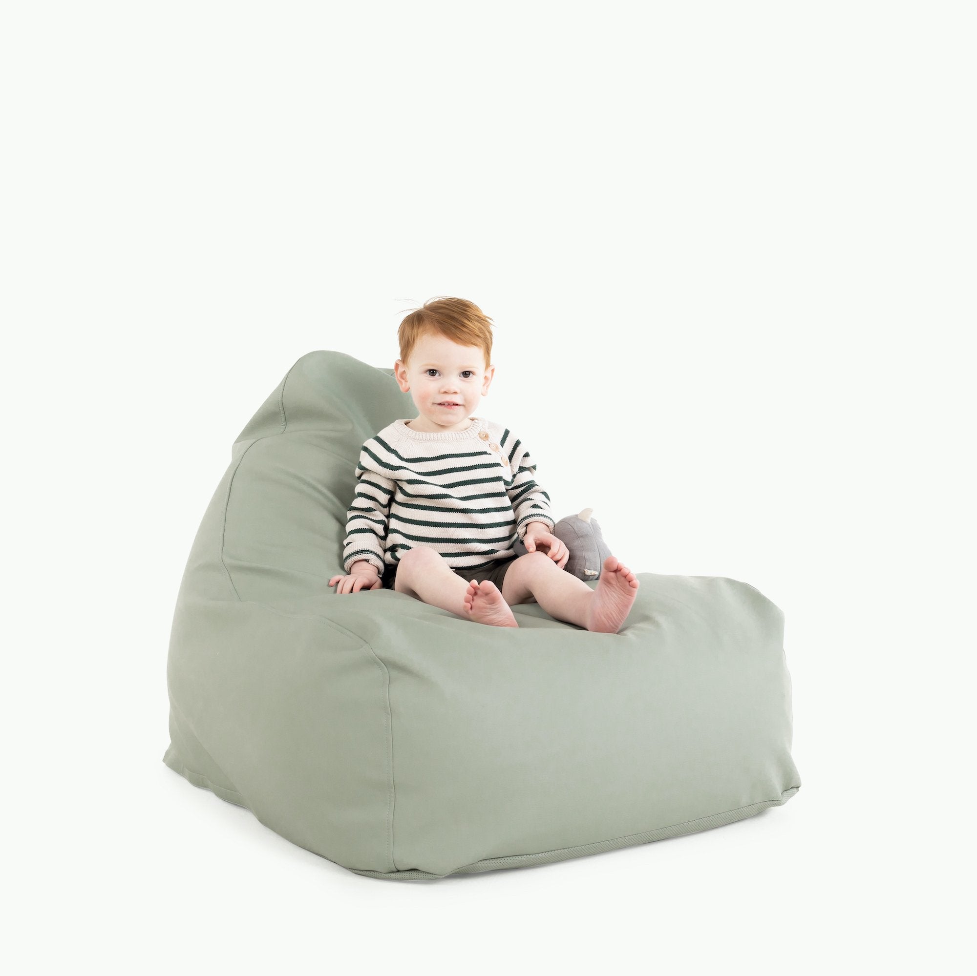 Palm (on sale)@Kid sitting on the Palm Lounger