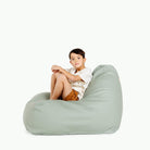 Palm (on sale)@Kid sitting on the Palm Lounger