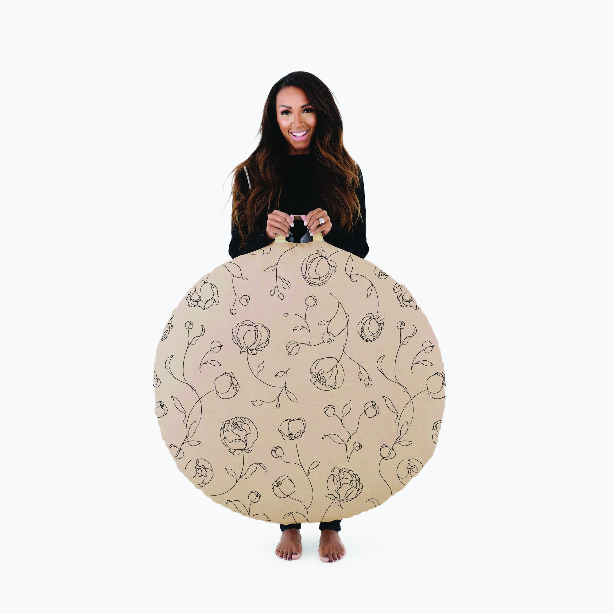 Peony (on sale) / Circle@Woman holding the Peony Circle Floor Cushion