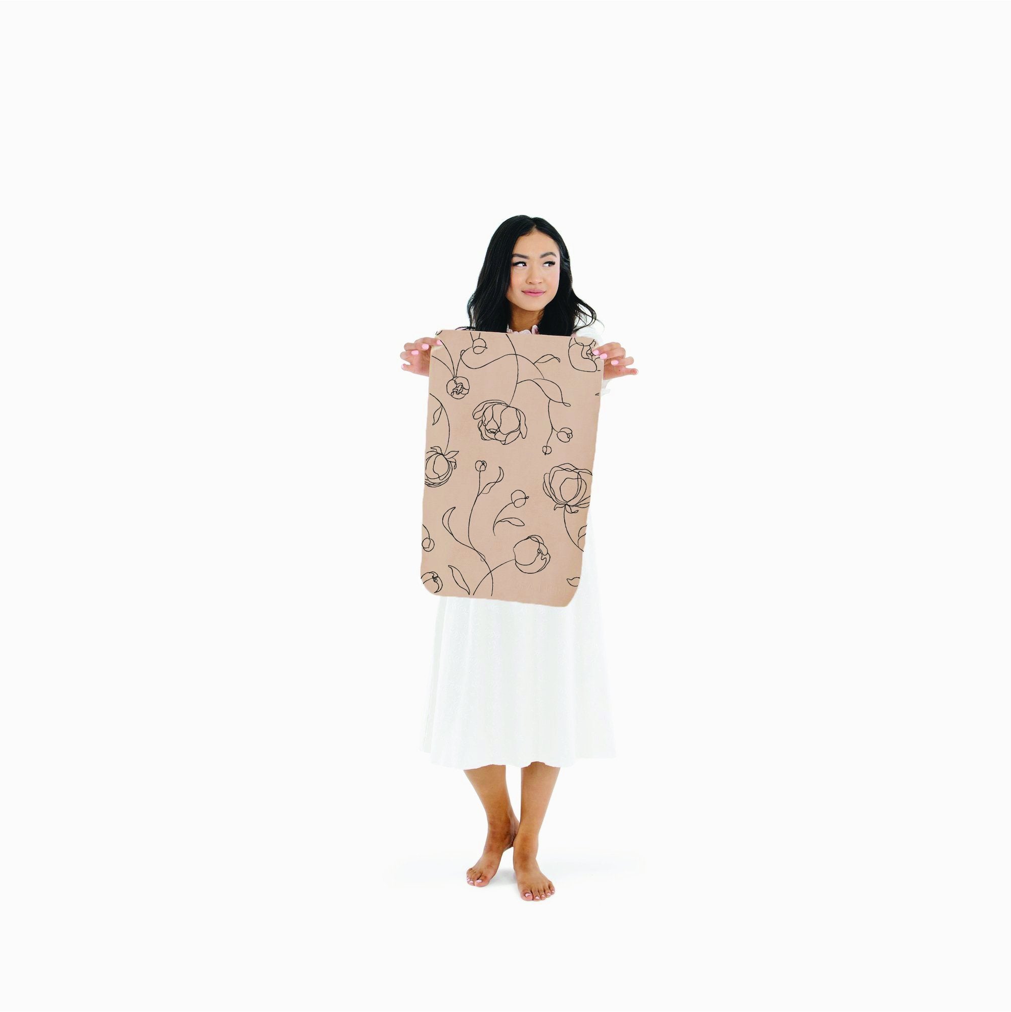 Peony (on sale)@Woman holding the Peony Micro Mat