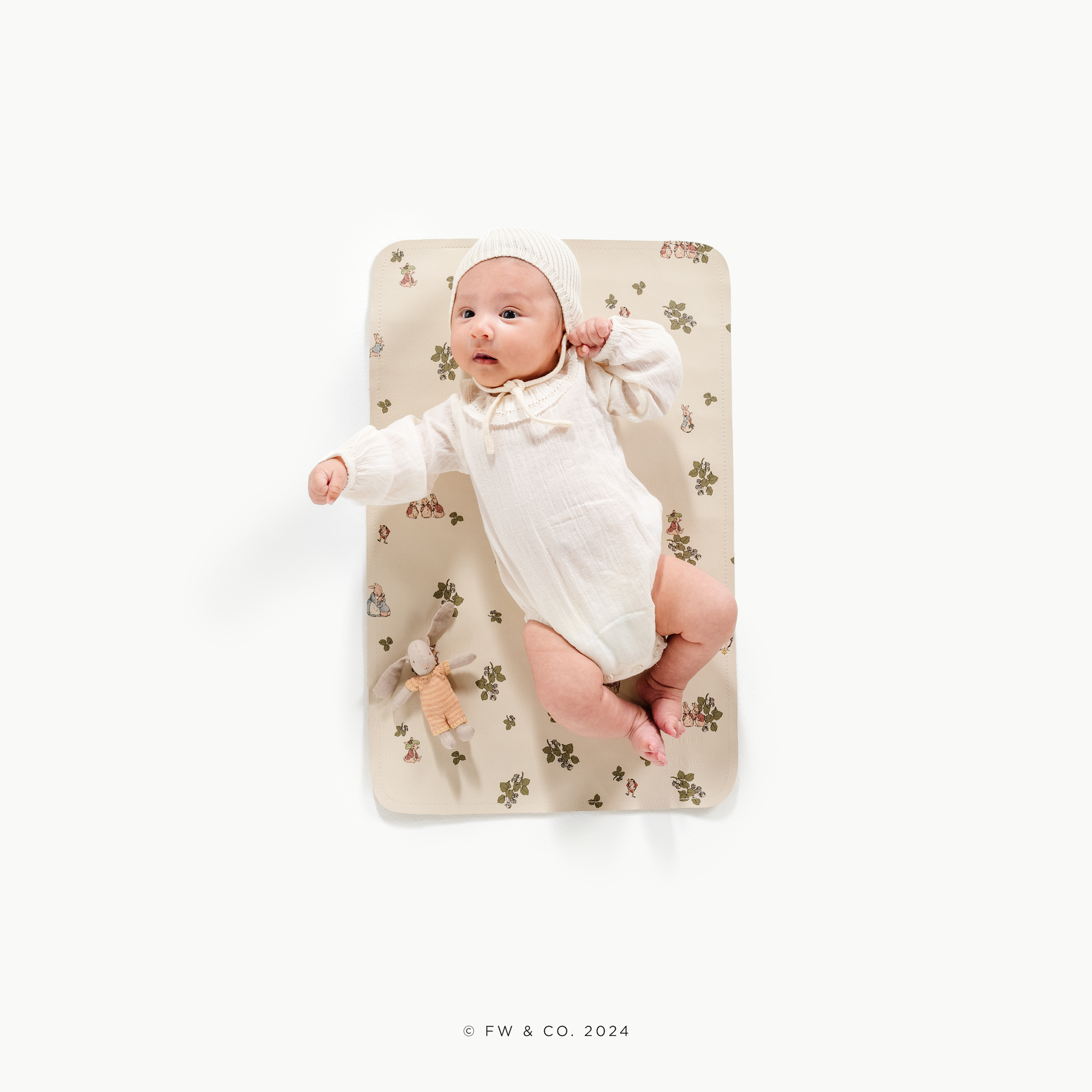 Peter Rabbit™@overhead of a baby on a Peter Rabbit micro mat