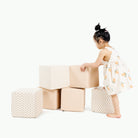 Pomelo (on sale)@Girl stacking up Pomelo Cubes