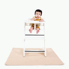 Pomelo (on sale)@Kid in highchair on the Pomelo Mini Mat