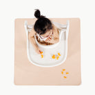 Pomelo (on sale)@Overhead of kid in highchair on the Pomelo Mini Mat