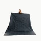 Raven / Square@Woman holding the Raven Maxi Square Mat