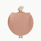 Sienna (on sale) / Circle@woman holding up the sienna midi circle mat