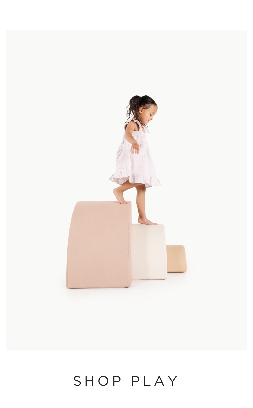 kid playing on arc playset