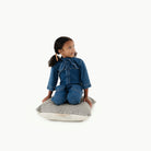 Stone Stripe / Square@Kid sitting on the Stone Stripe Mini Square Floor Cushion