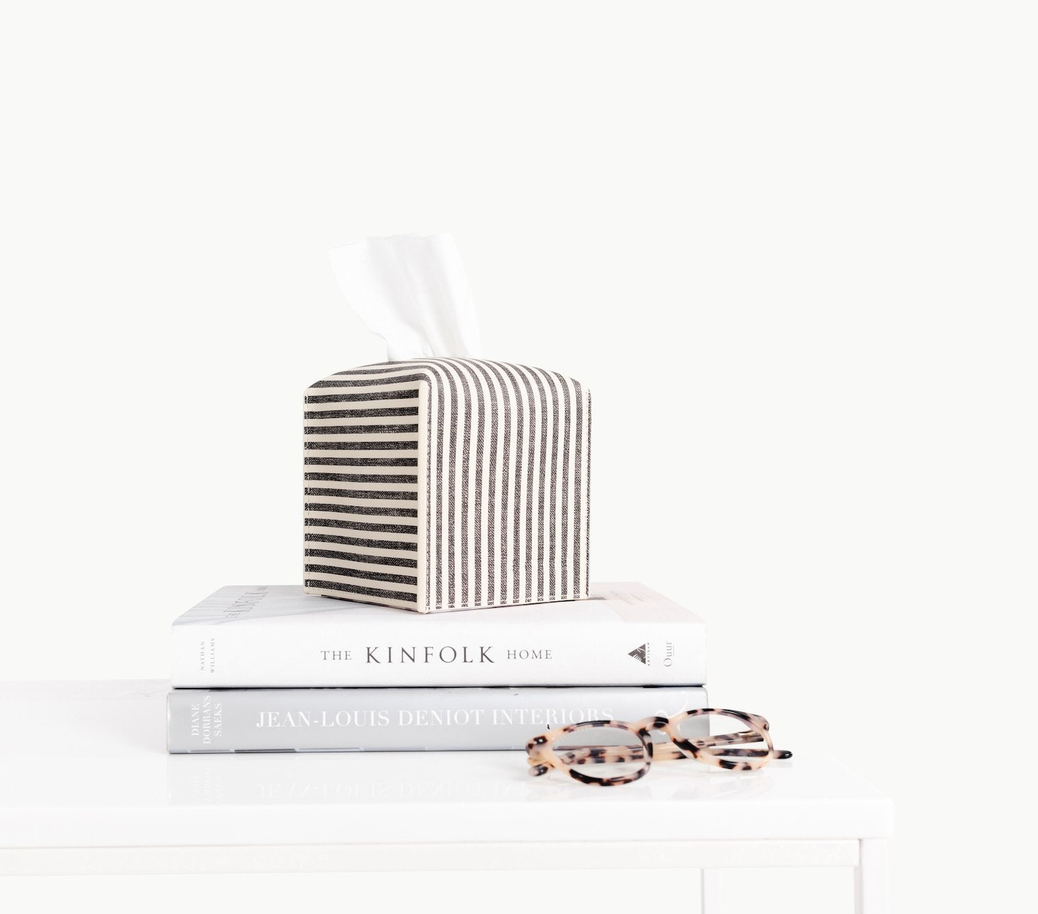 Stone Stripe@Stone Stripe Tissue Box Cover on table with books