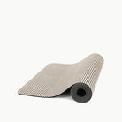 Stone Stripe (on sale)@the small stone stripe home mat rolled up