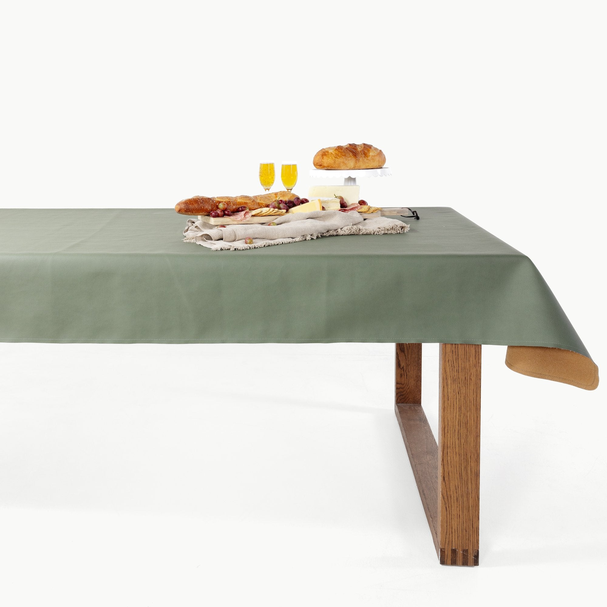 Thyme • Fog (on sale) / 6 Foot@Thyme/Fog Tablecloth on a table
