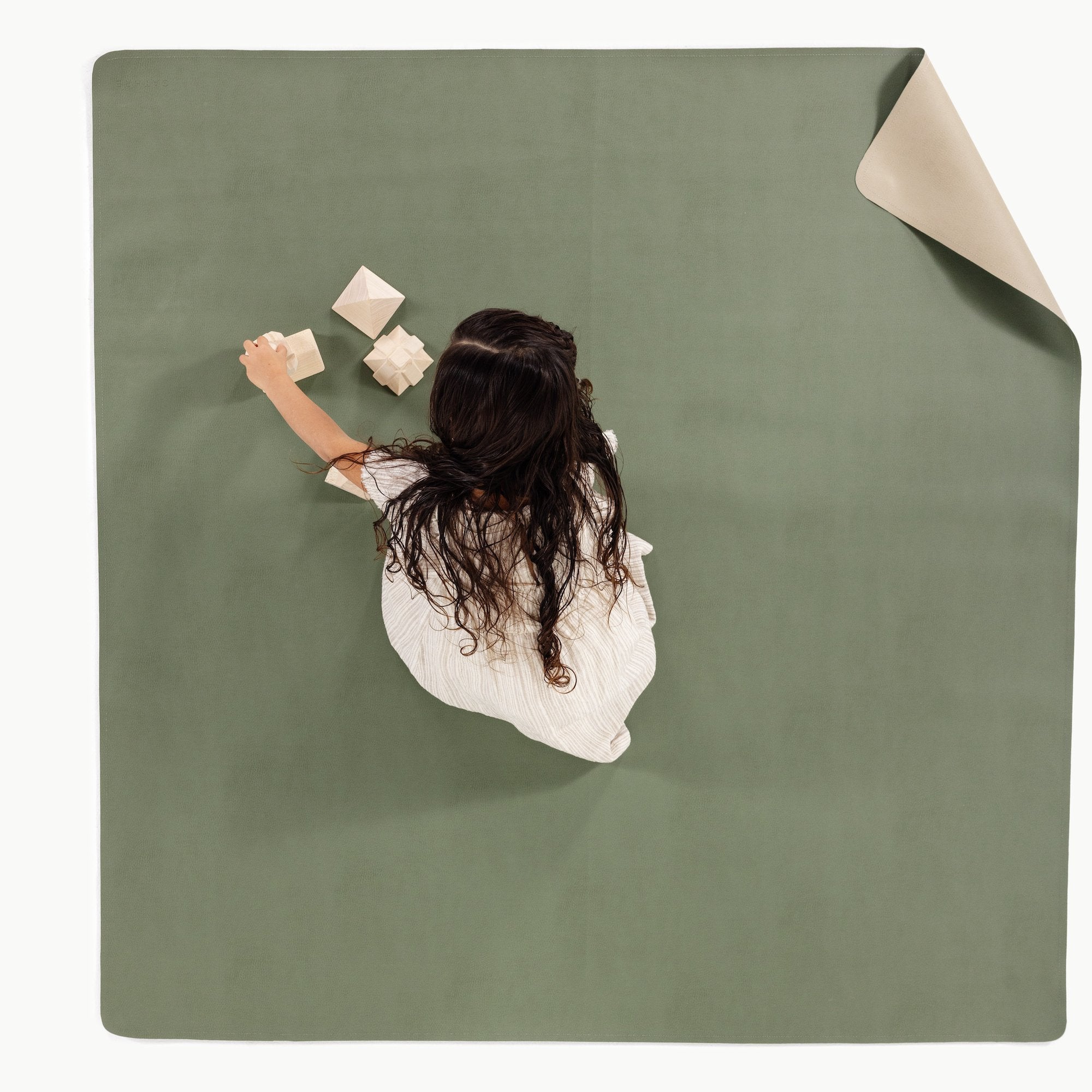 Thyme • Fog (on sale) / Square@Overhead of kid playing on the Thyme/Fog Midi Square Mat