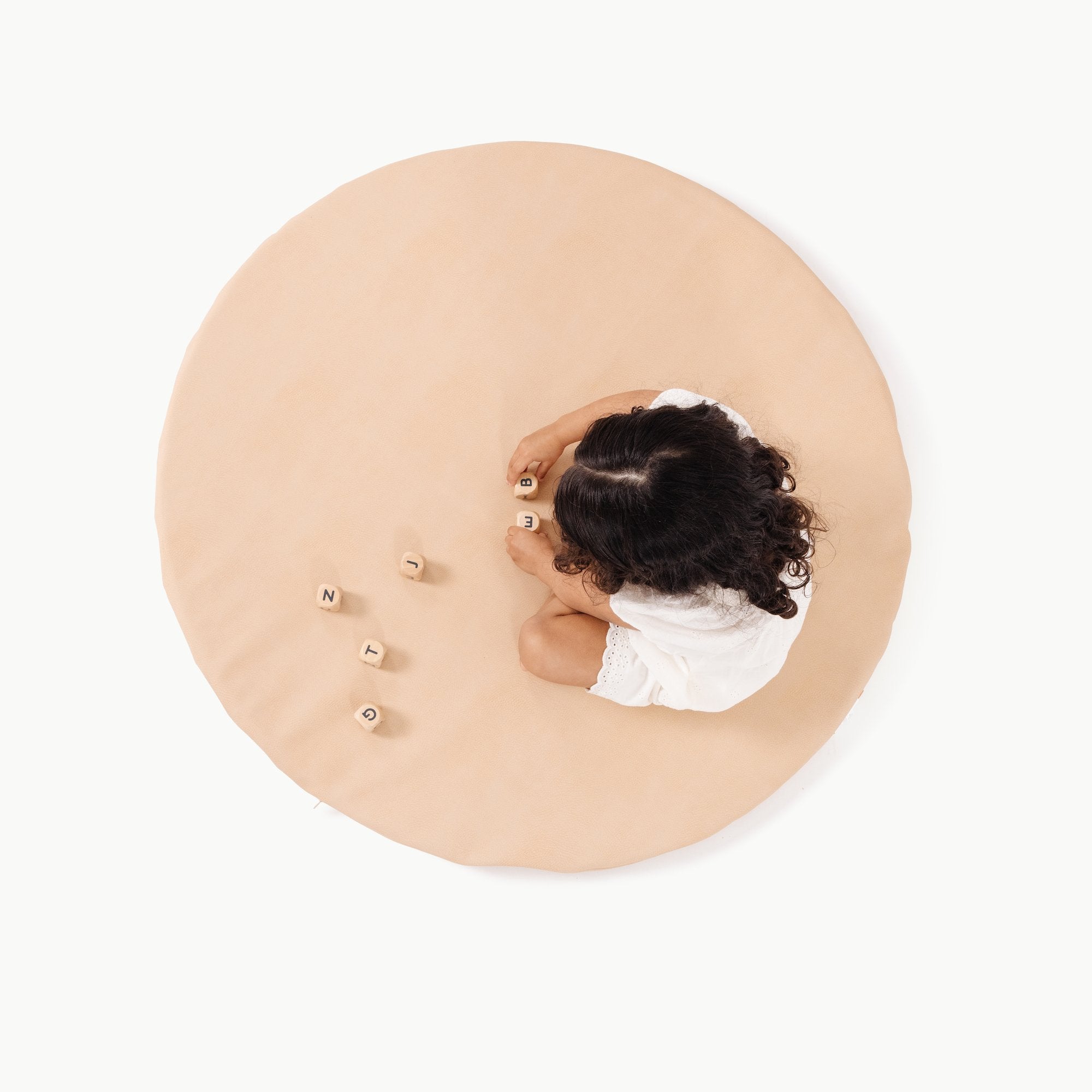 Untanned / Circle@Overhead of kid playing on Untanned Padded Mini Circle