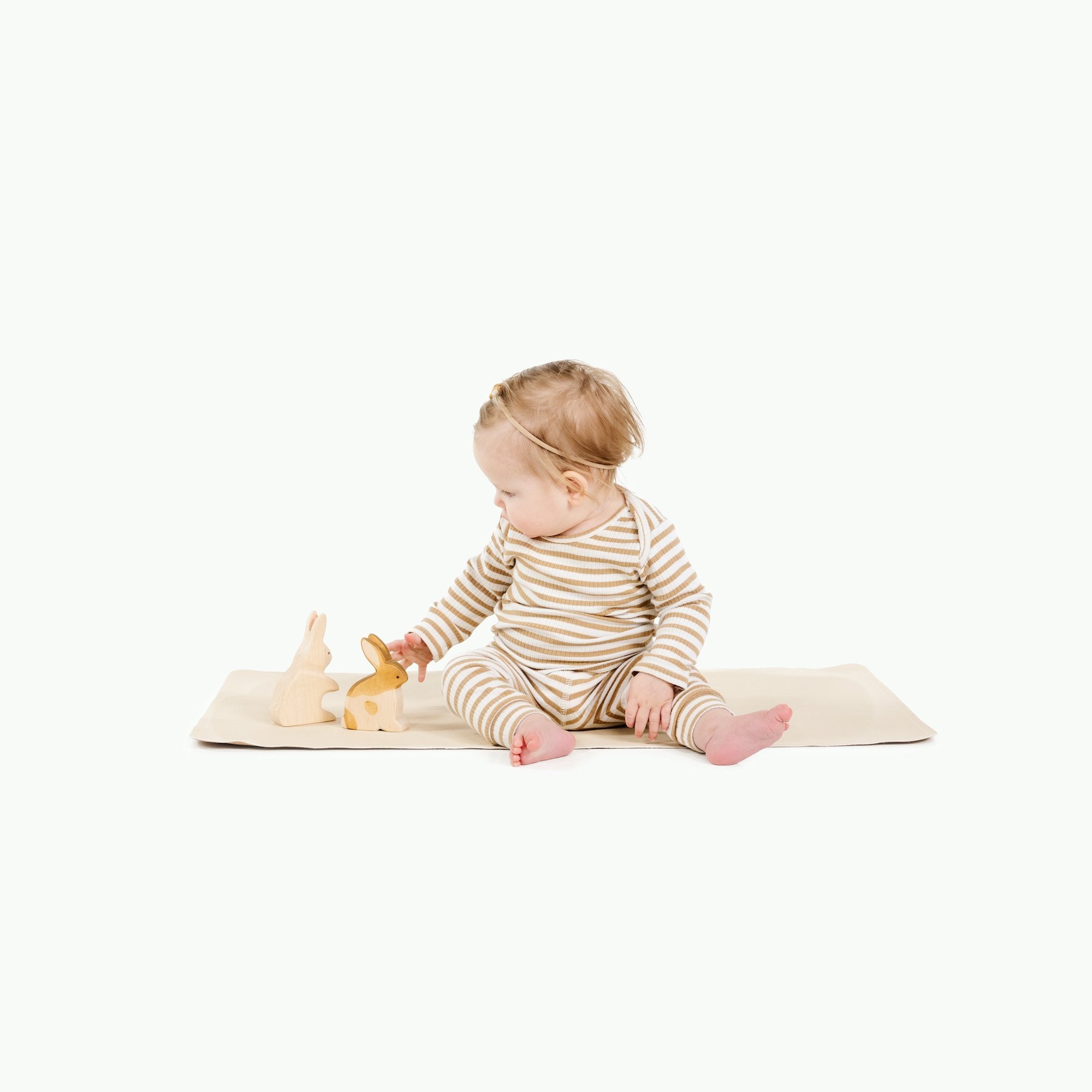 Wool (on sale)@Baby sitting on the Wool Micro+ Mat