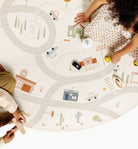 Commons@overhead of kids playing on the midi circle commons mat