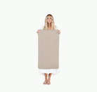 Ember (on sale)@Woman holding the Small Ember Home Mat
