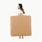 Camel / Square@woman holding the camel square floor cushion