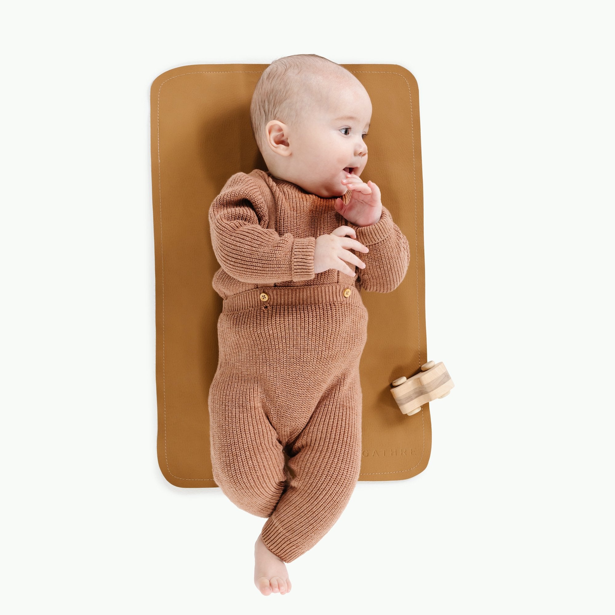 Camel@Overhead baby sitting on the Camel Micro mat 