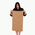 Leopard (on sale)@Woman holding a Small Leopard Home Mat