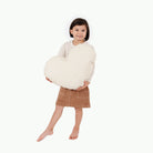 Ivory (on sale)@Kid holding the Ivory Heart Pillow