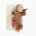 Ivory@Overhead baby sitting on the Ivory Micro mat