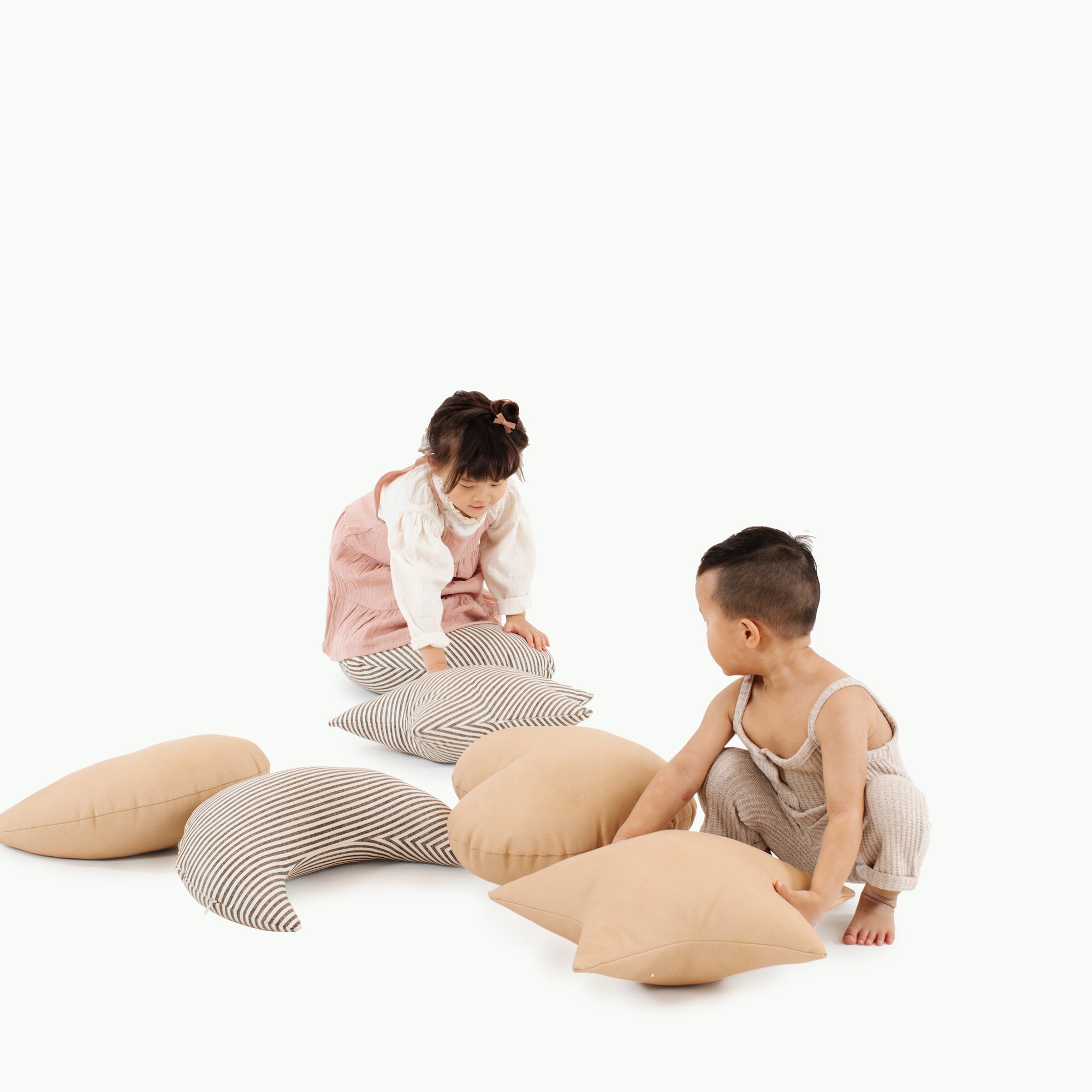 Untanned (on sale)@Kids playing with the Untanned Heart Pillow