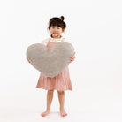 Stone Stripe (on sale)@Kid holding the Stone Stripe Heart Pillow