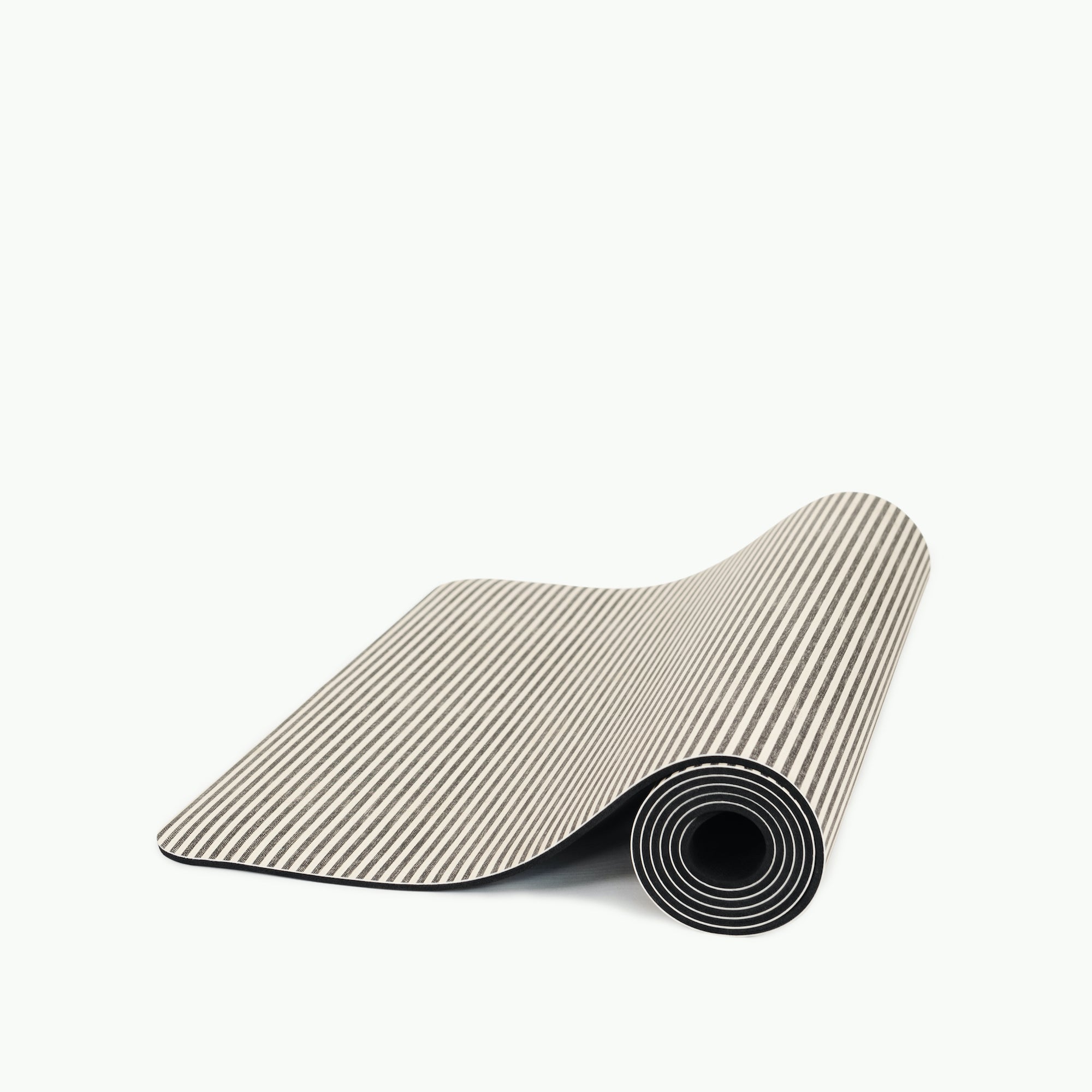 Stone Stripe (on sale)@the stone stripe medium home mat rolled up